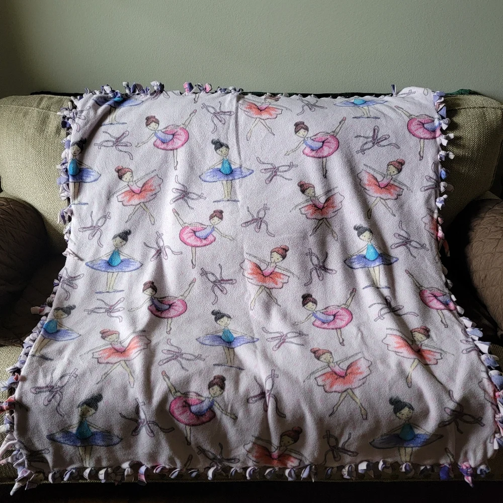 Ballerina acid-wash look fleece blanket. Hand tied.